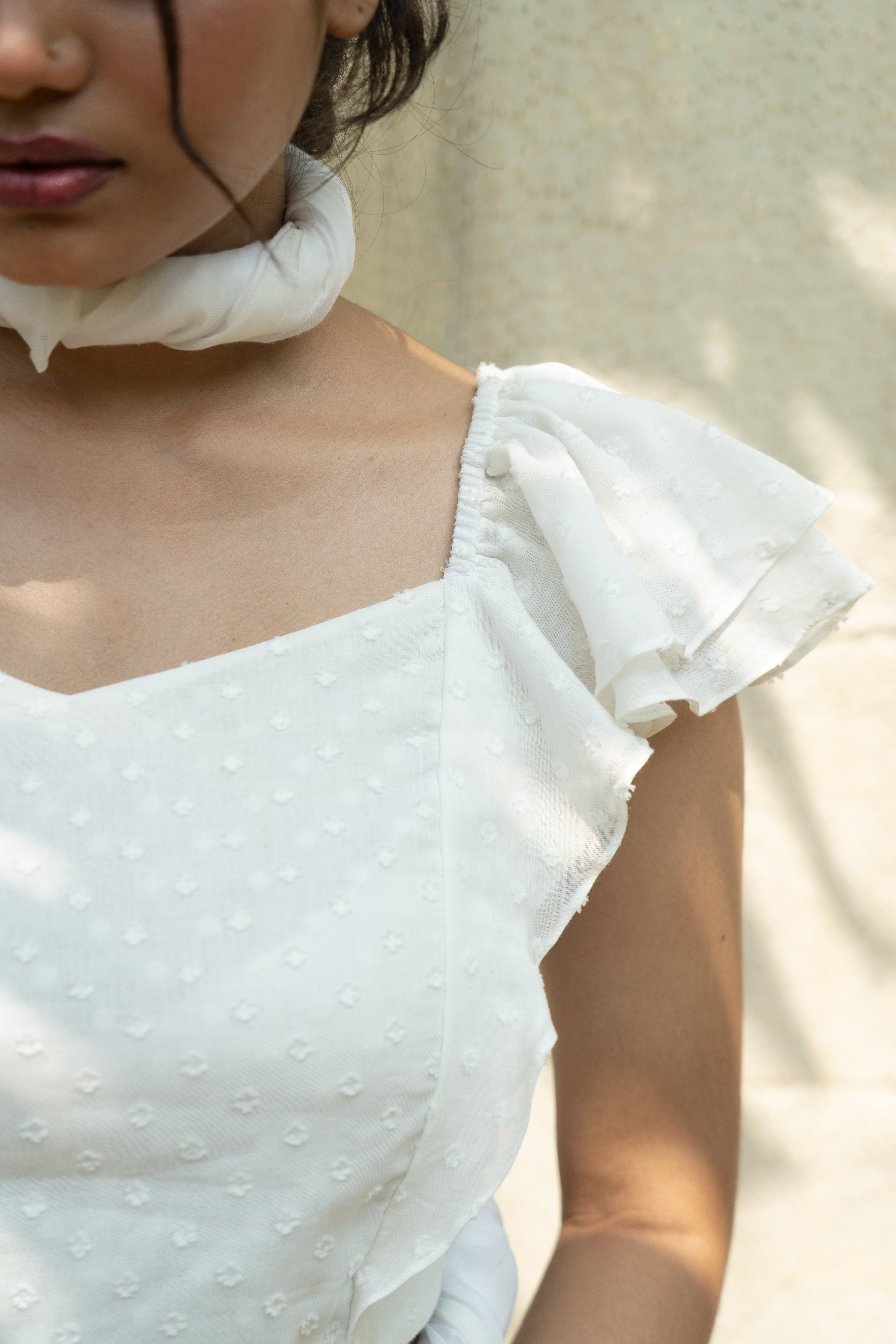 RUFFLED BLANC